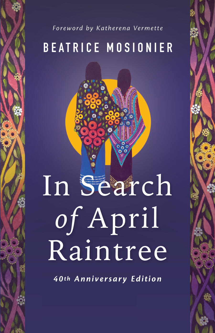 An image shows the cover of Beatrice Mosionier’s novel, In Search of April Raintree, which depicts two women standing side by side, facing the sun, in colourful clothing.